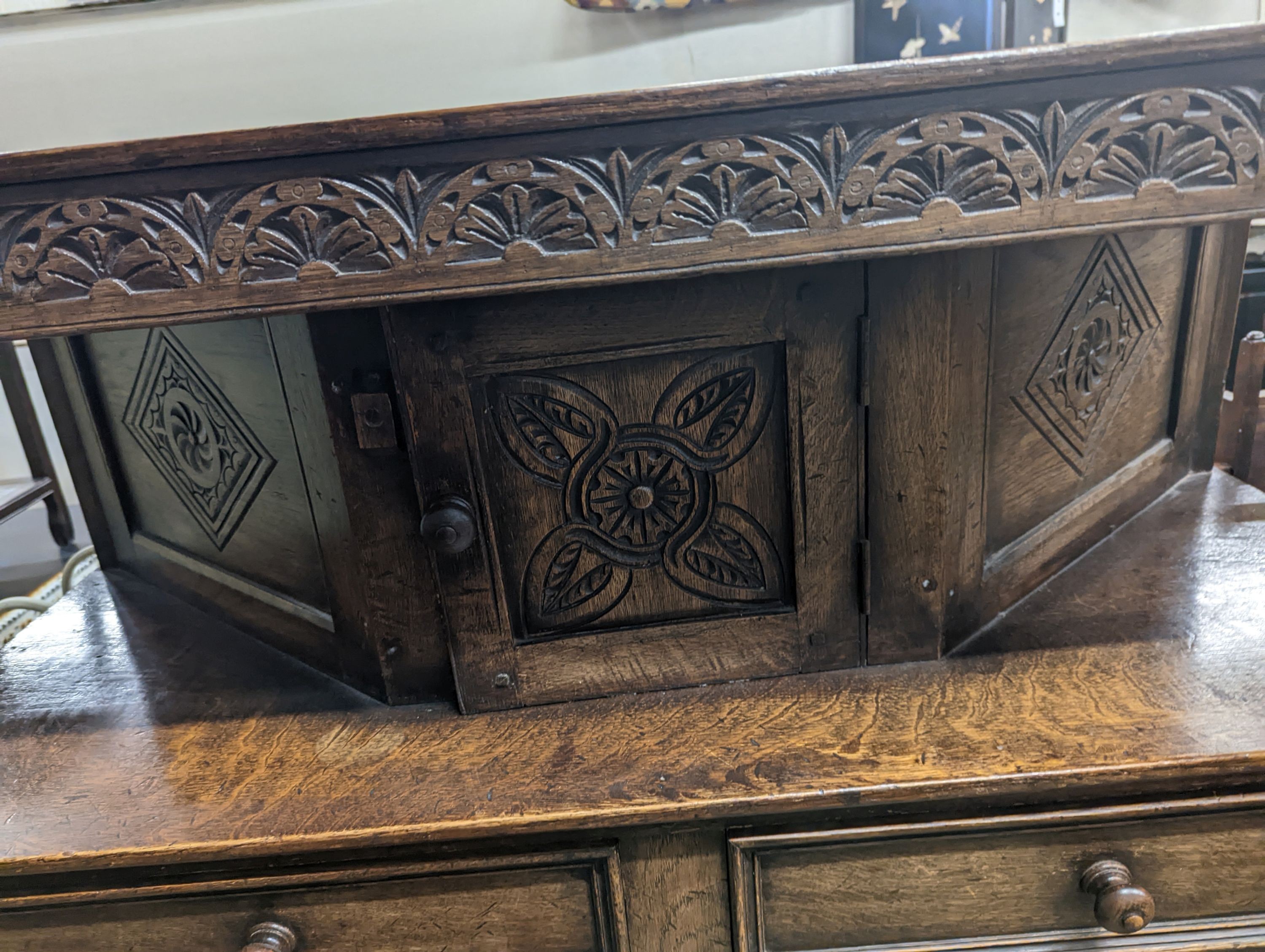 An 18th century style oak court cupboard, length 108cm, depth 43cm, height 128cm